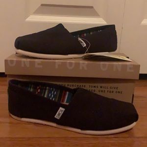 Toms black slip on shoes